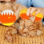 Massaging cat with 3 in 1 Pet Steam Brush